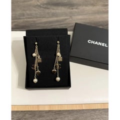 Chanel Gold CC Heart Perfume Charm Dangle Earrings