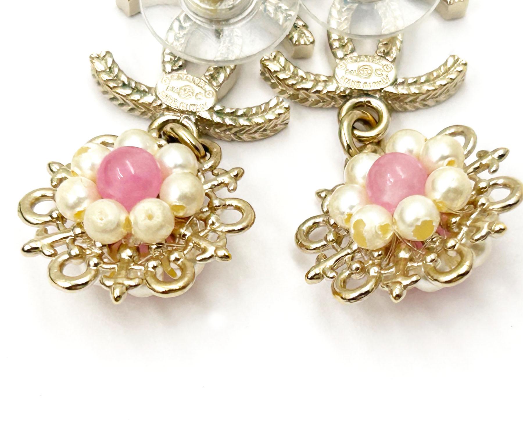 Women's Chanel Gold CC Pink Bead Pearl Wheel Piercing Earrings  For Sale