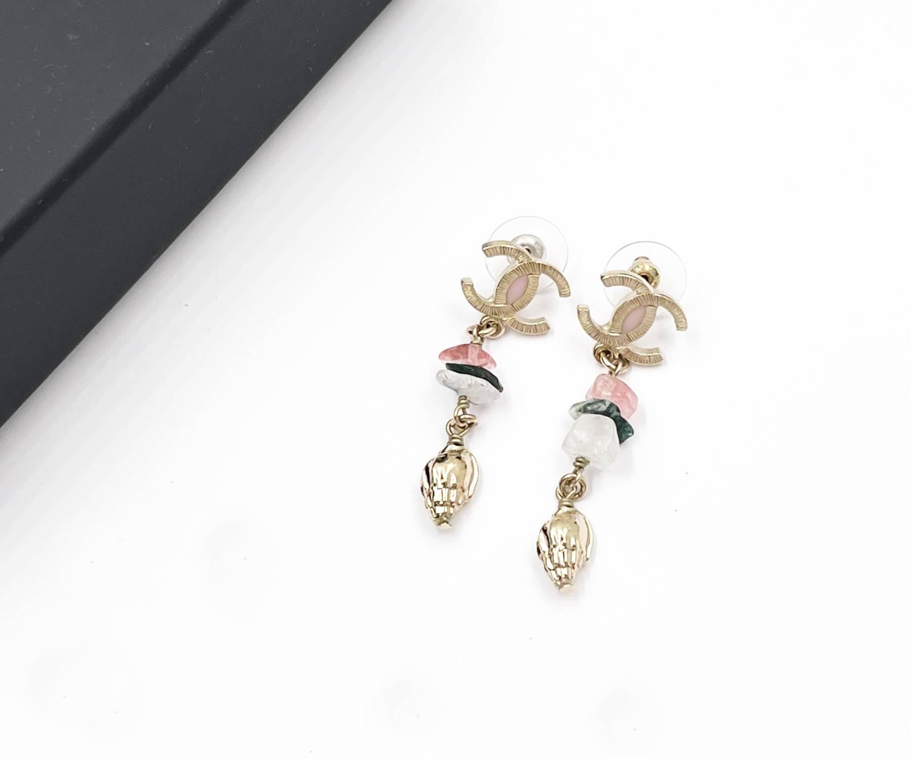 Chanel Gold CC Pink White Stone Shell Dangle Piercing Earrings

* Marked 17
* Made inF France
* Comes with original box, pouch and booklet

-It's approximately 2