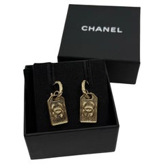 CHANEL Gold CC Plate Dangle Earrings