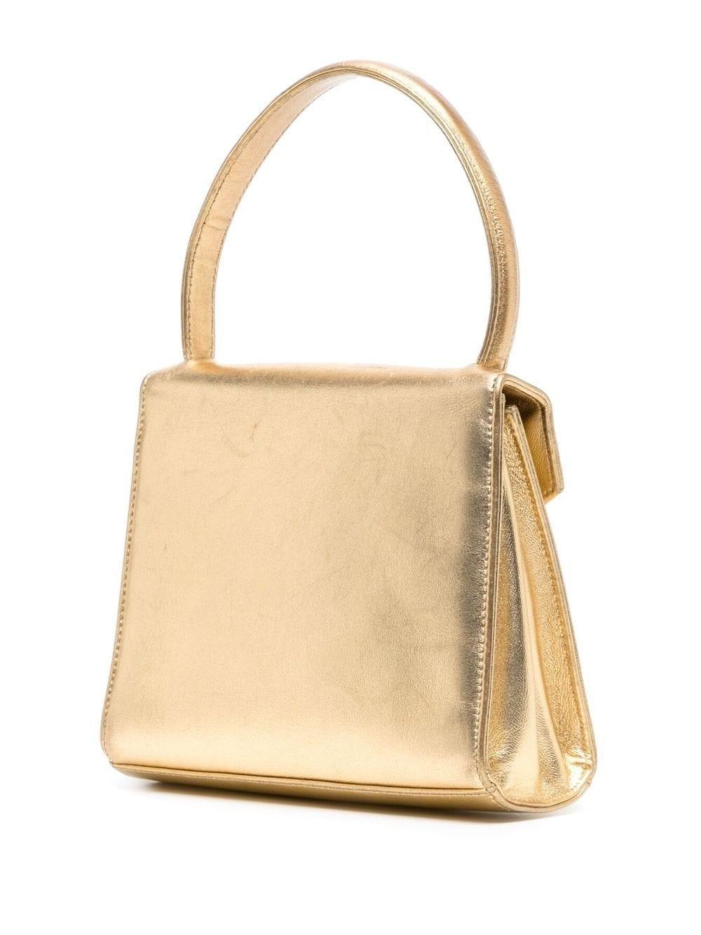 Chanel Gold CC Turn-Lock Mini Tasche im Zustand „Gut“ in London, GB