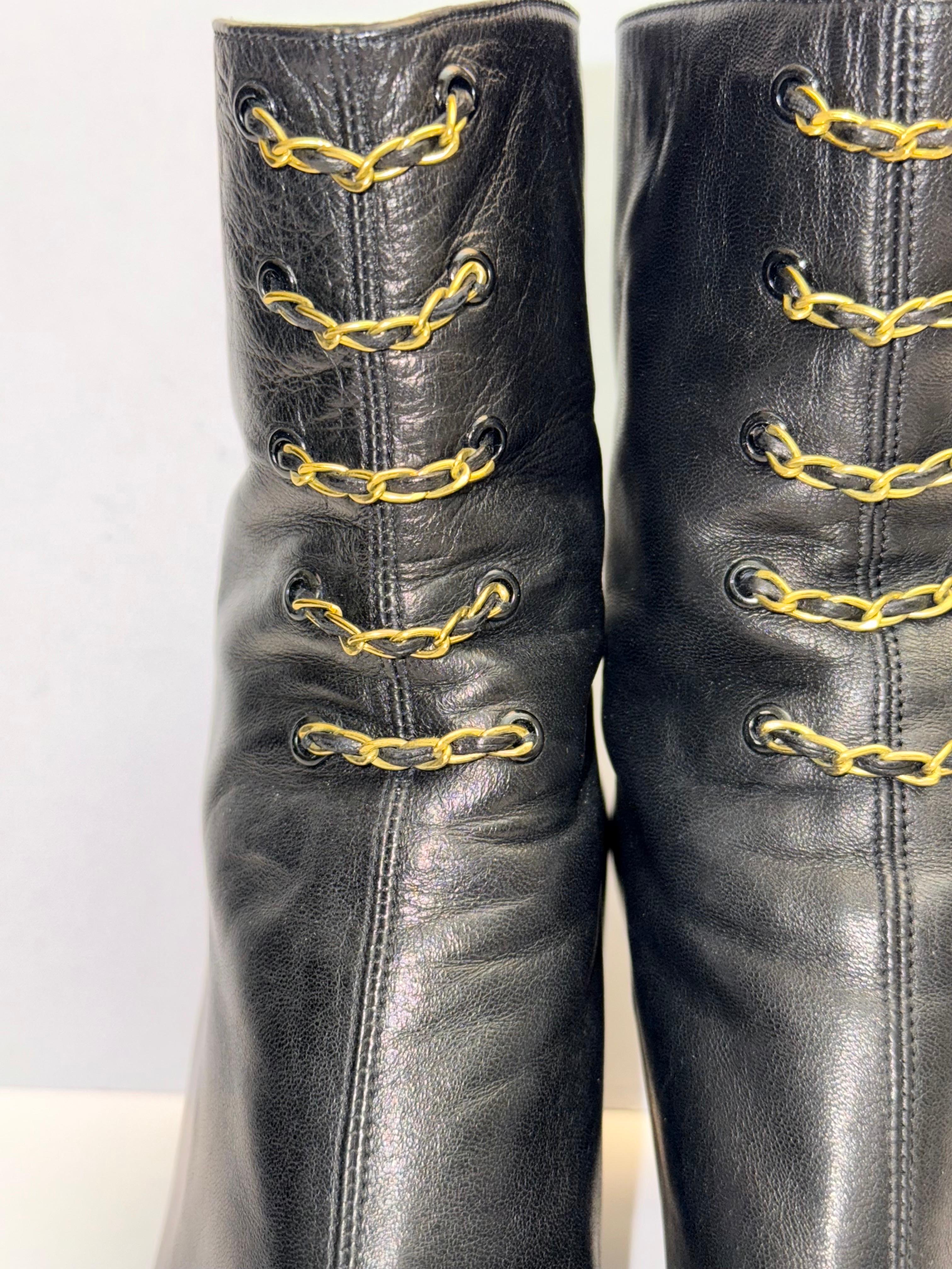 - Vintage 90's Iconic Chanel gold chain hardware leather ankle boots. Chanel always stay chic, stylish and well made. 

- Size 37.5. 

- Preowned. 

