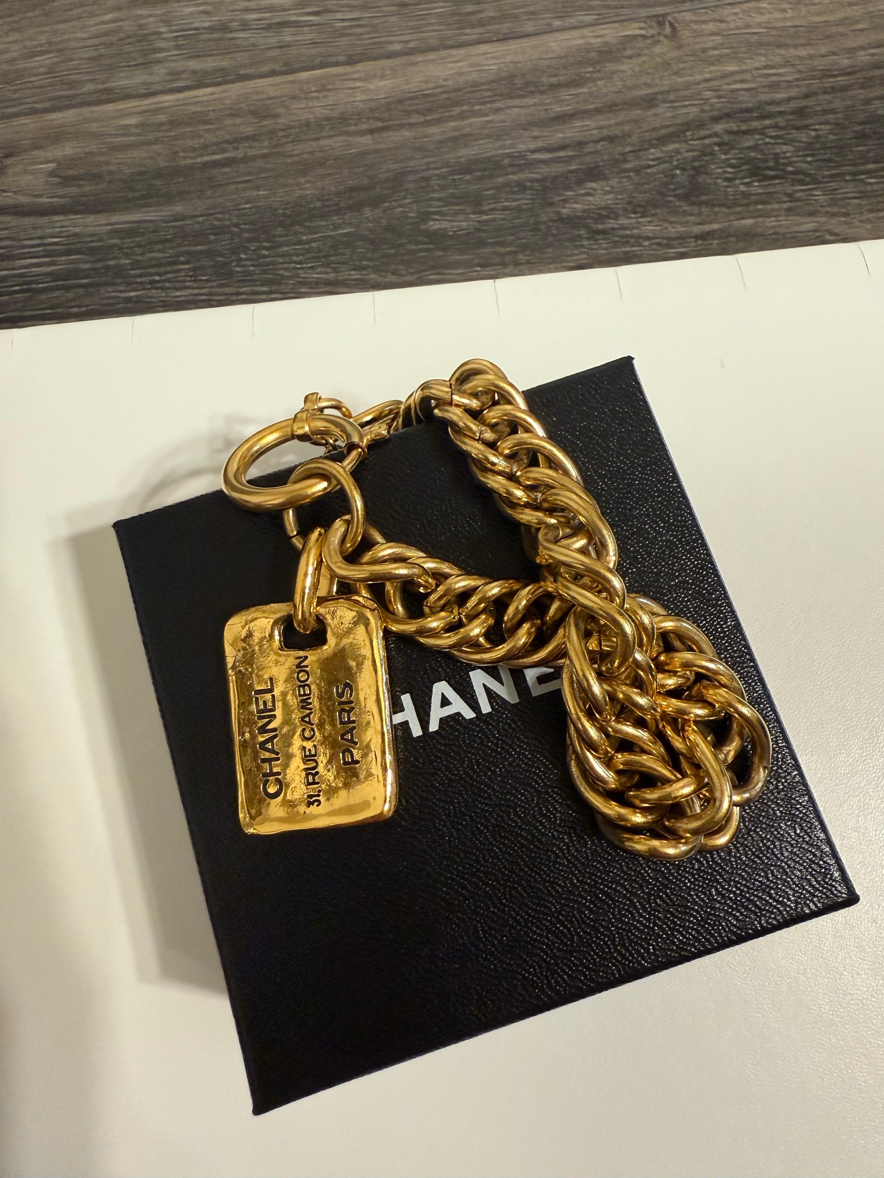 Stunning vintage Chanel rue cambon gold charm bracelet 
100% authentic
From the Late 1970's - Early 1980's Collection
Made in France
Gold plated
Very good condition overall aside from light wear and scratches throughout
Comes with box