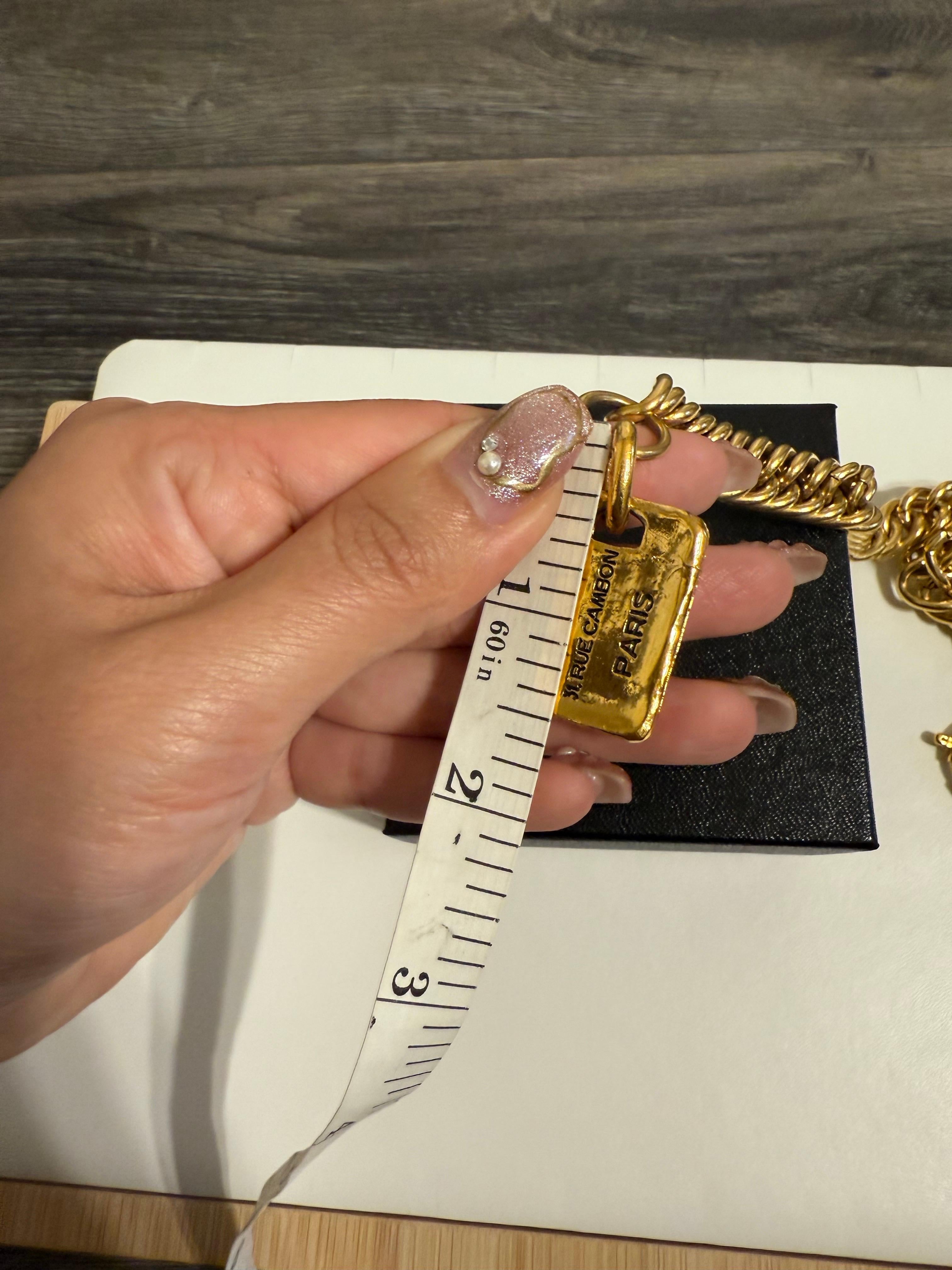 Women's or Men's Chanel Gold Chain Vintage 31 Rue Cambon Paris Charm Bracelet For Sale