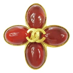 Vintage Chanel Gold Charm CC Flower Cross Gripoix Red Glass Evening Pin Brooch