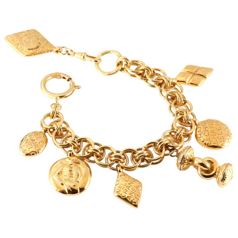 Chanel Gold Charm Vintage Bracelet at 1stDibs  vintage gold charm bracelet,  chanel charm bracelets, chanel charms for bracelets