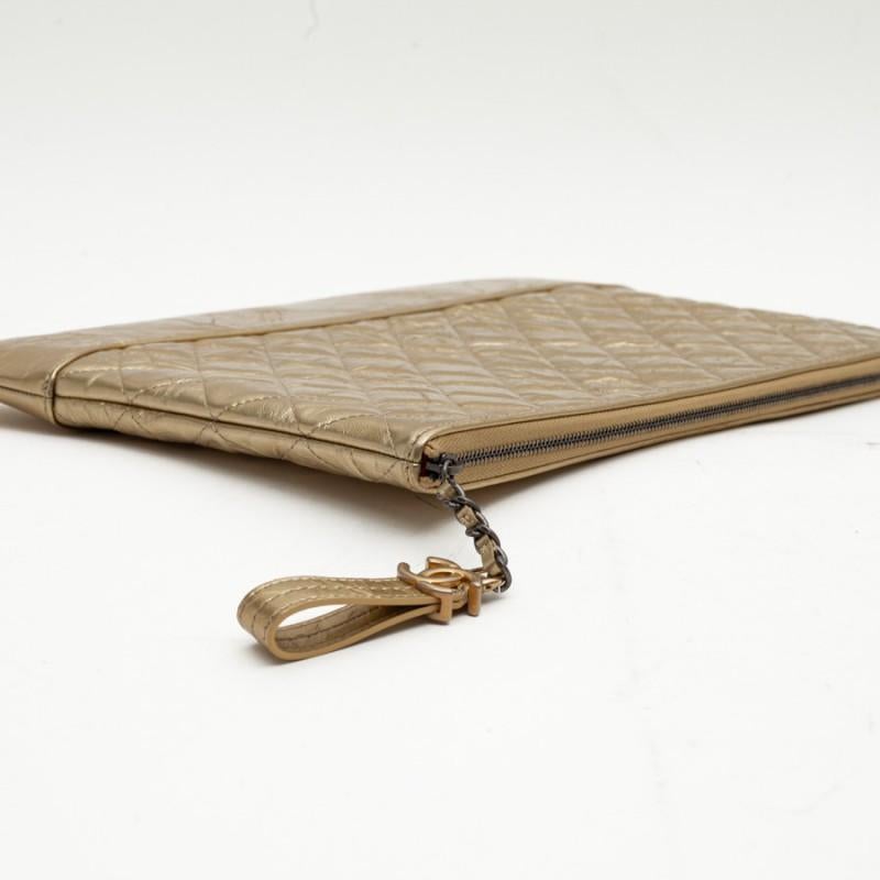 CHANEL Gold Clutch In Aged Leather 1