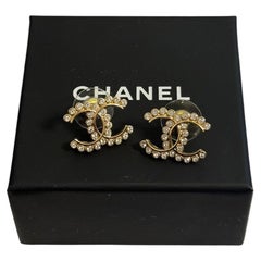 Boucles d'oreilles Chanel Logo CC en cristal doré