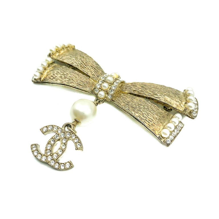 Chanel Gold Crystal and Pearl Bow CC Brooch 2006 For Sale at 1stDibs