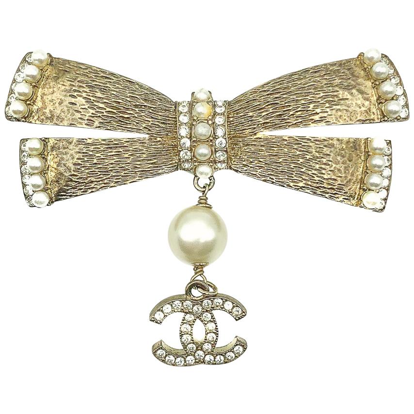 Chanel Gold Crystal & Pearl Bow CC Brooch 2006 For Sale