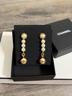 CHANEL Gold Faux Pearl Dangle "CHANEL" CC Statement Earrings
