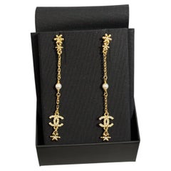 CHANEL Gold Flower Crystal CC Long Chain Dangle Earrings