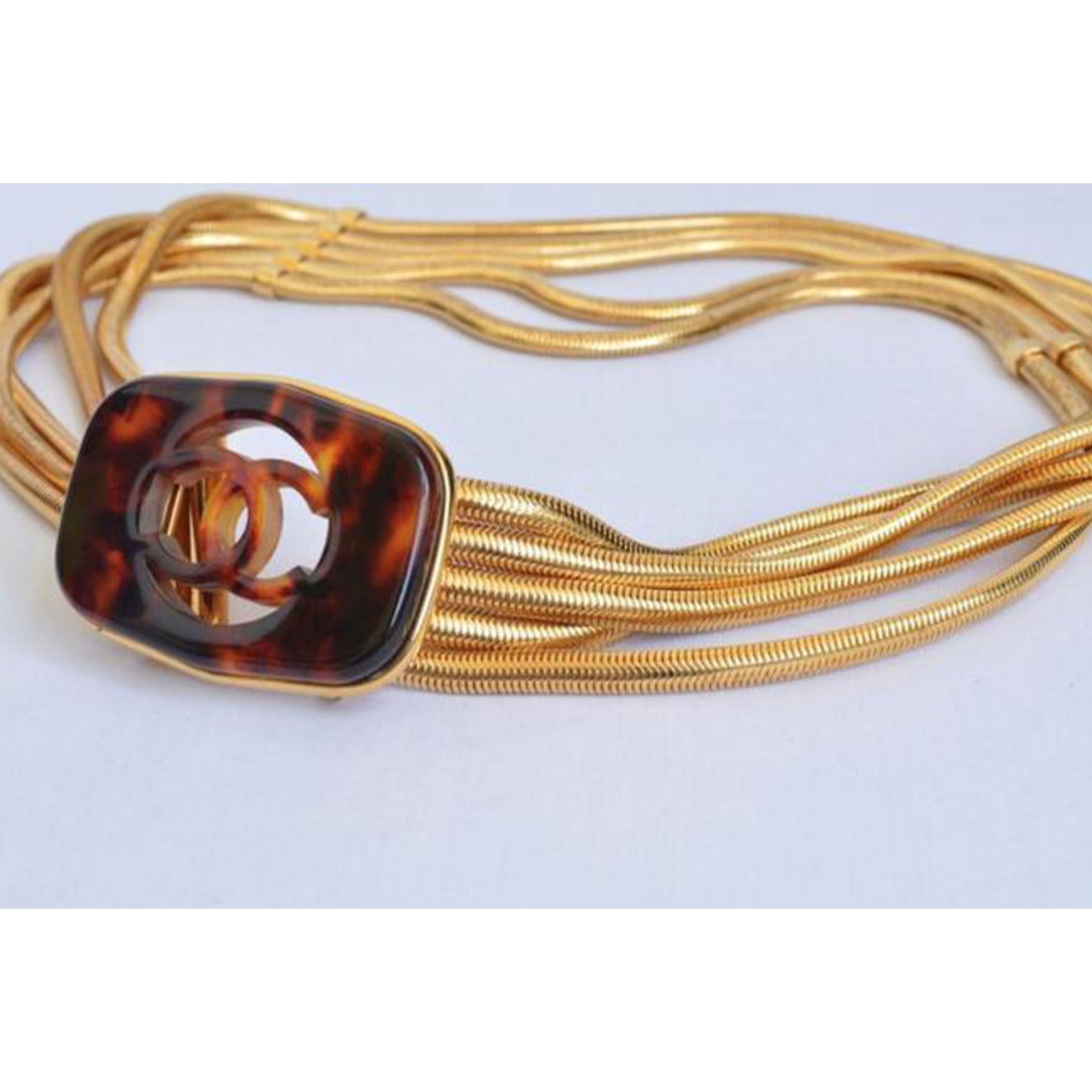 Add a splash of regal, ultra stylish appeal to your ensemble with this belt! We love the tortoise shell - it really adds such a gorgeous textural feel to the piece!

Designer: Chanel
Condition: Excellent. 
Content: Metal
Color: Gold
Fits Waist Size: