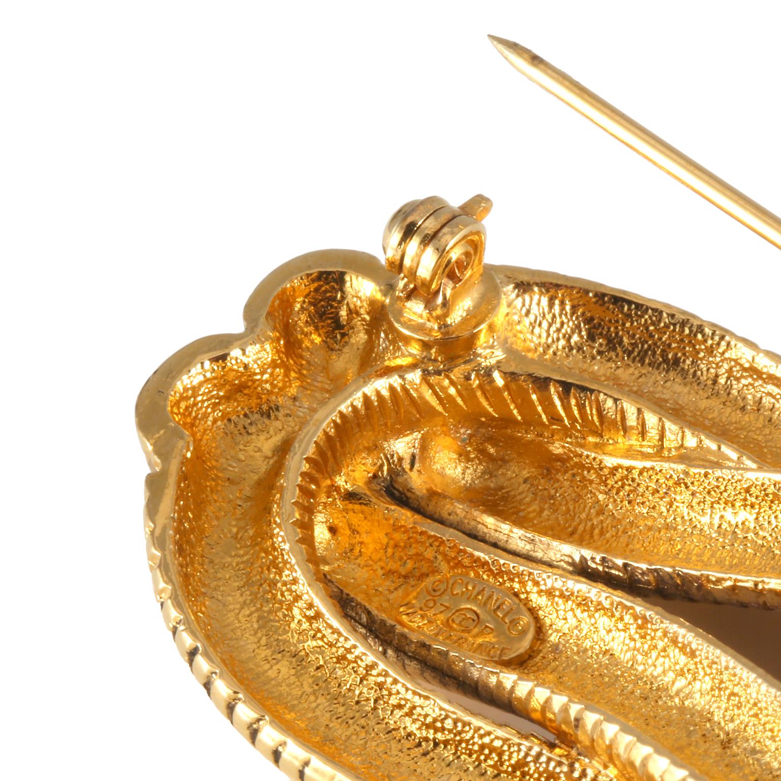 gold chain brooch