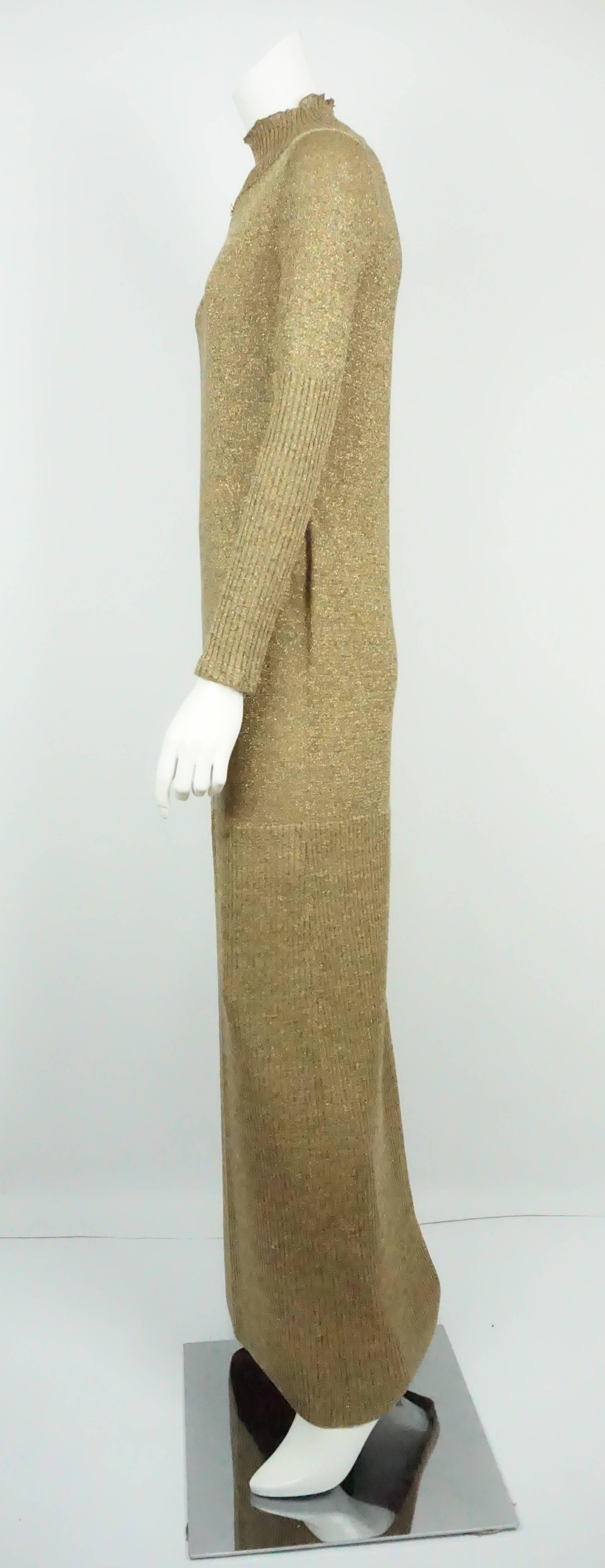 Chanel Gold Lame Knit Gown/Maxi Dress - 42 - 09A  This stunning and chic Chanel knit maxi dress/gown can be used both for a cocktail or black tie event. The gown has a high ribbed neckline, Long Sleeves with the same ribbing through more than half
