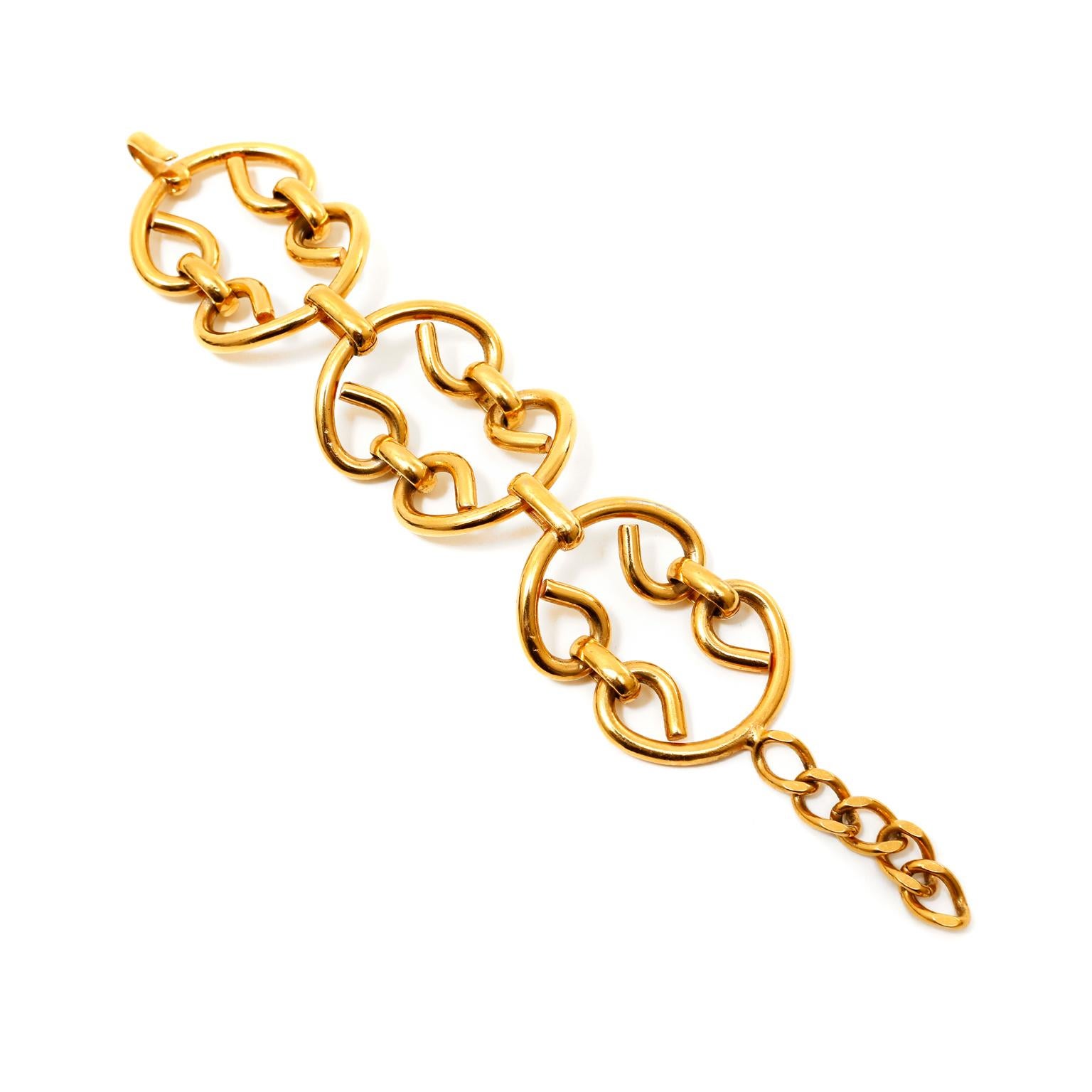 This authentic Chanel Gold Large Link Bracelet is in excellent condition.  24 karat gold plated articulated bracelet.  Approximately eight inches long, one and a half inches wide.
PBF 10760
