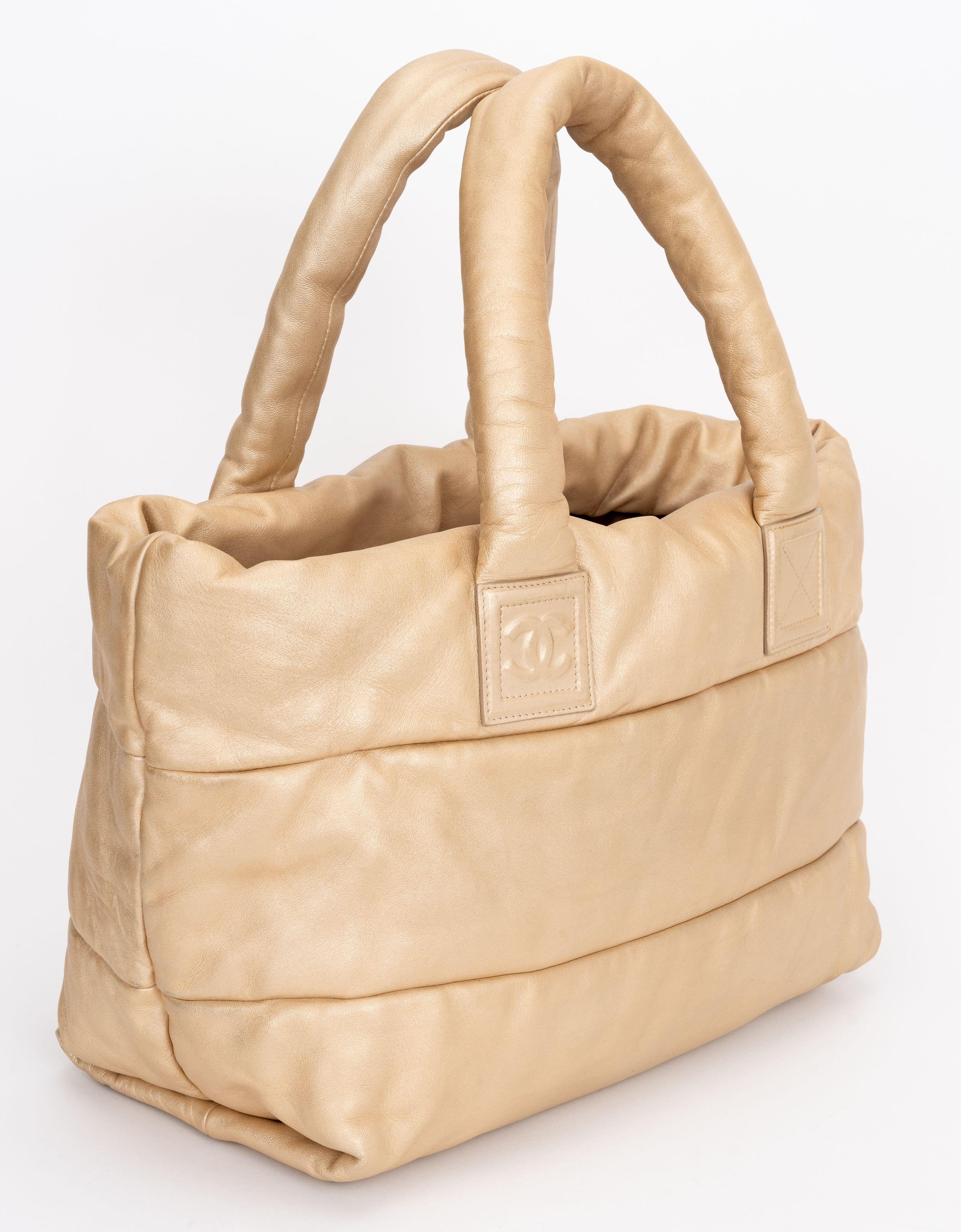 The Coco Cocoon Tote made from soft Lambskin and Brushed Gold Hardware is the essential everyday tote. It features one compartment with hook closure and one interior zipper pocket
Shoulder drop 7