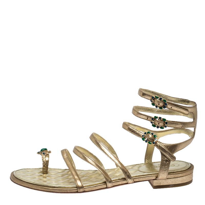 All of the creations from Chanel are designed in such a way that people will halt and admire. These sandals have been crafted from leather and styled with straps and quilted insoles. They also flaunt stunning metal and enamel detailing on the toe