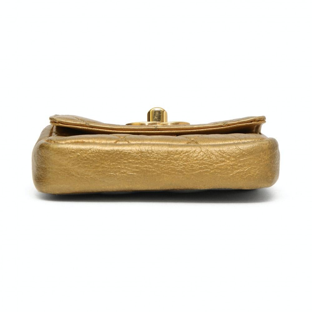 Chanel gold leather minaudièr handbag
Depth 2 cm

