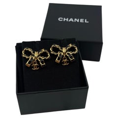 Chanel Gold Leather Woven CC Bow Dangle Earrings