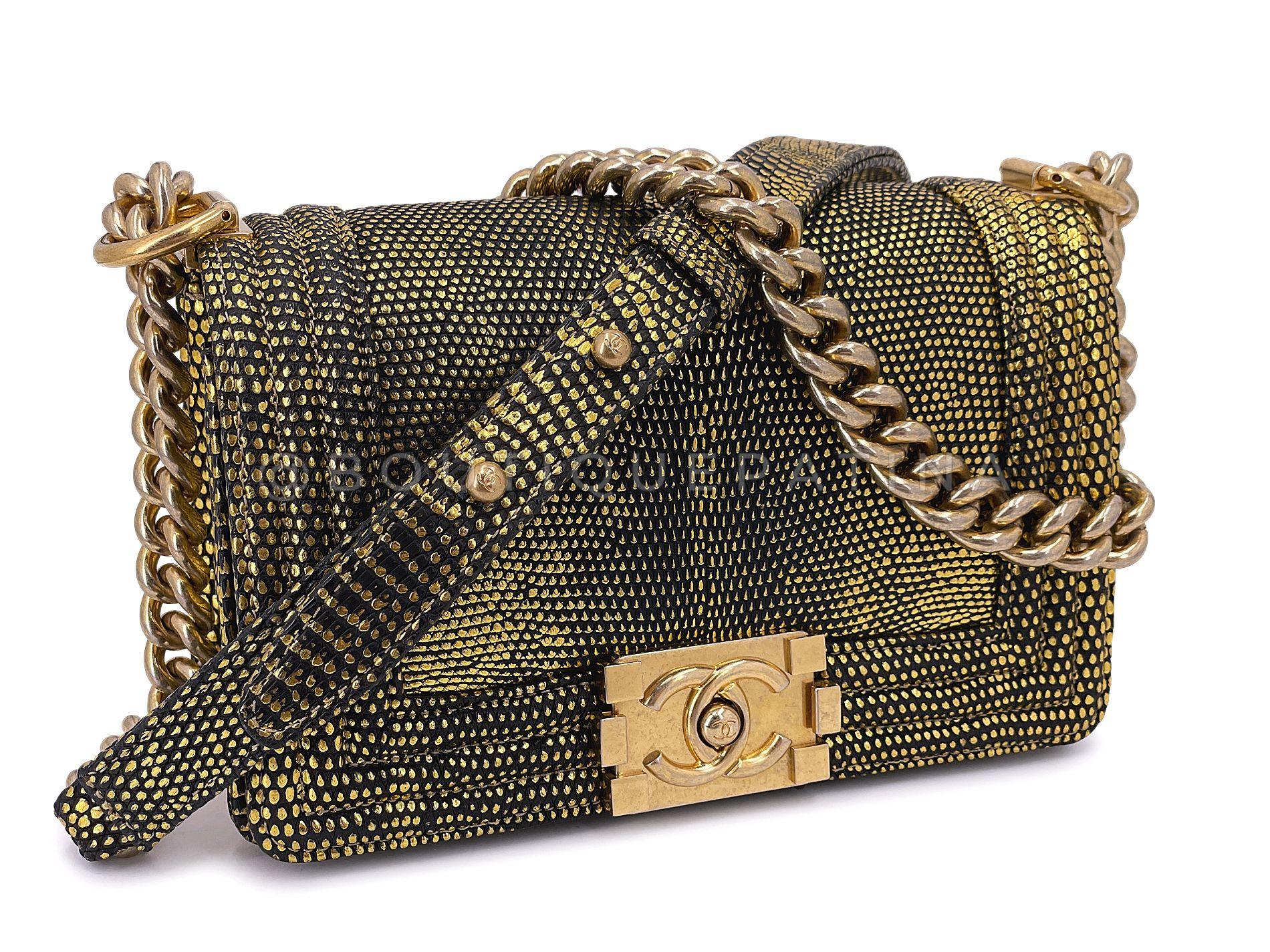 Store item: 67969
No longer produced in special exotics, this Chanel Gold Lizard Small Boy Flap Bag GHW comes in pristine condition in a very special ornate color way. 

The aged gold thick chunky chain can be worn long or short. Pinch clasp opens