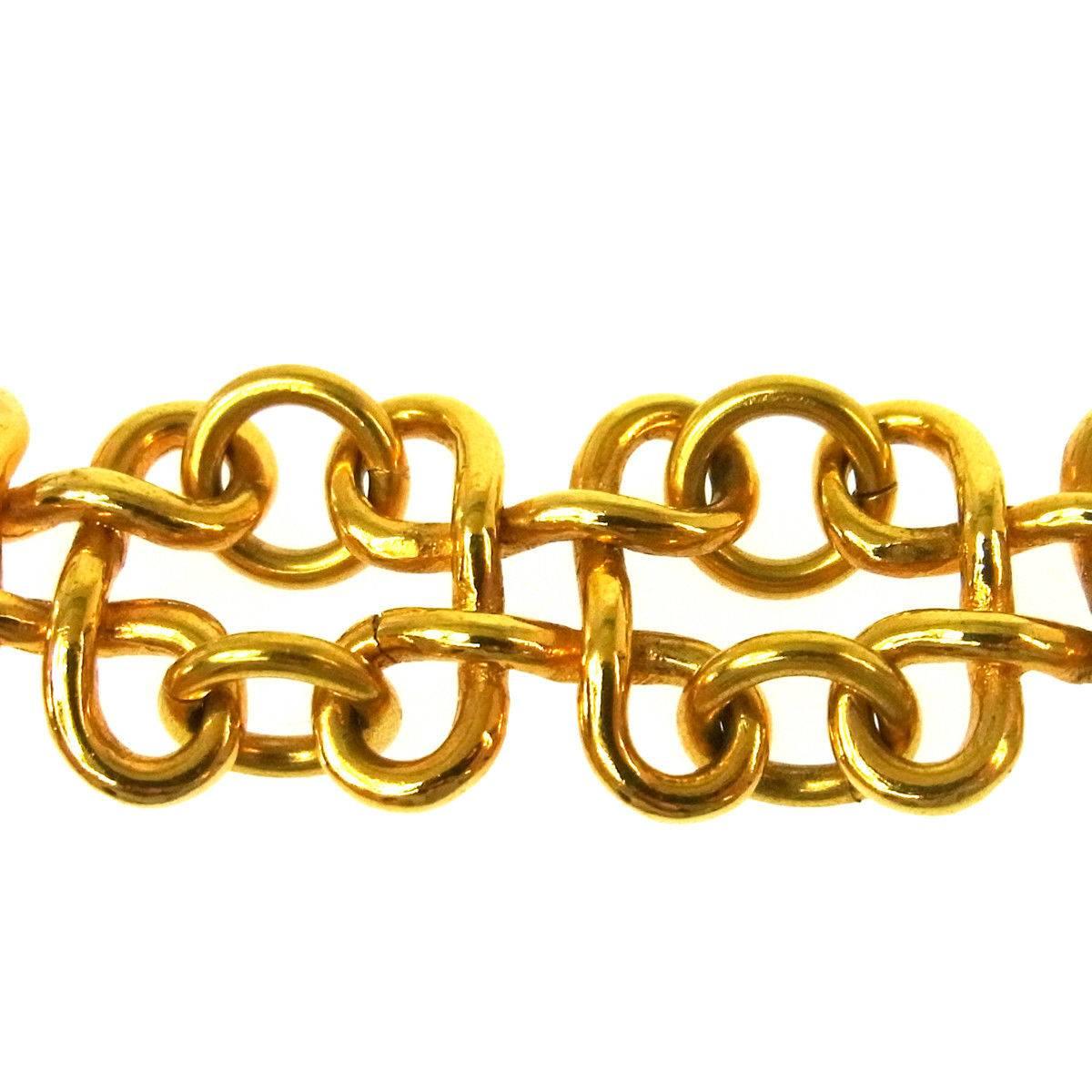 Chanel Gold Logo Charm Braided Twist Statement Evening Bracelet  In Excellent Condition In Chicago, IL