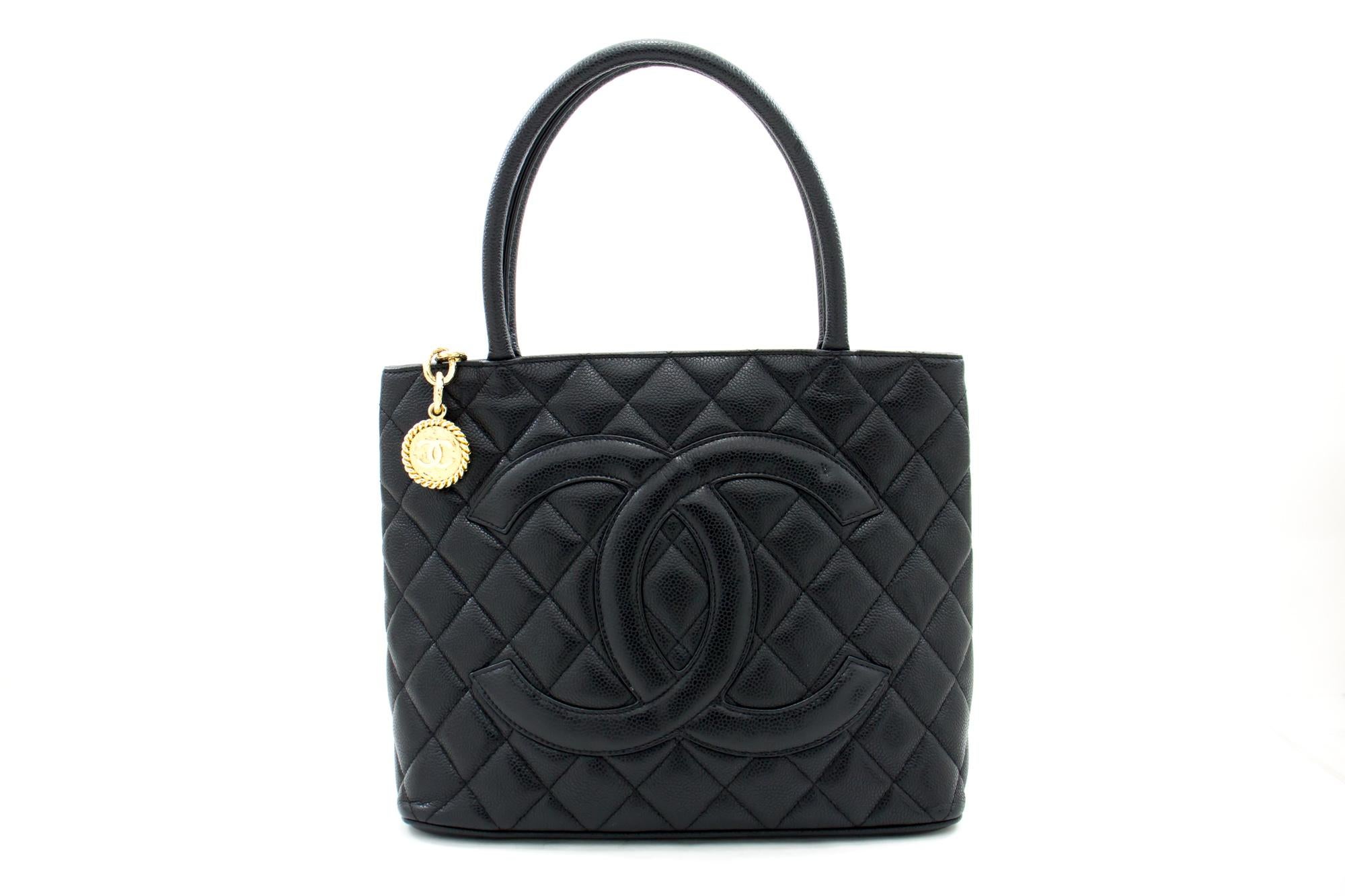 An authentic CHANEL Gold Medallion Caviar Shoulder Bag Grand Shopping Tote. The color is Black. The outside material is Leather. The pattern is Solid. This item is Contemporary. The year of manufacture would be 2009.
Conditions & Ratings
Outside