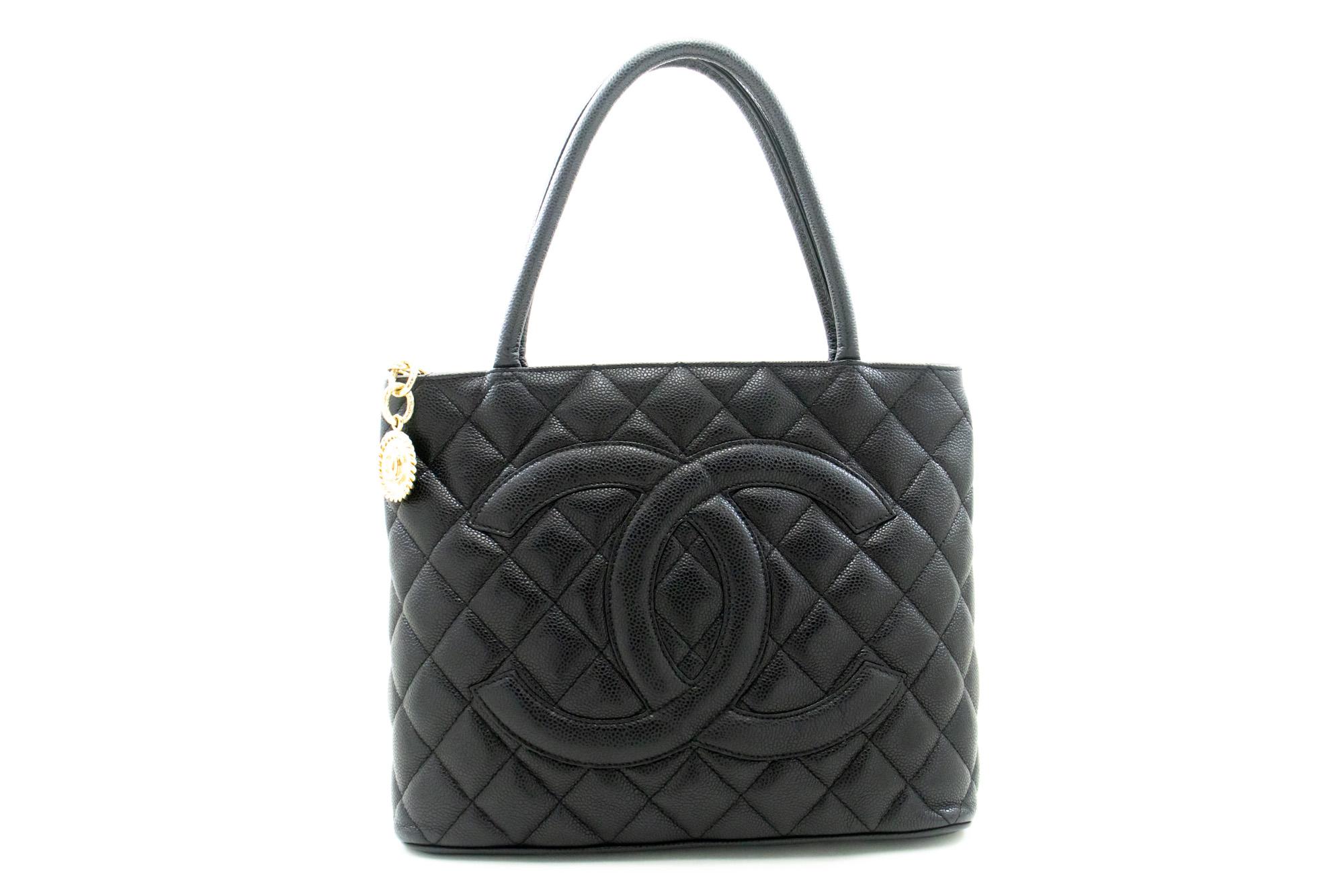 An authentic CHANEL Gold Medallion Caviar Shoulder Bag Grand Shopping Tote. The color is Black. The outside material is Leather. The pattern is Solid. This item is Contemporary. The year of manufacture would be 2010.
Conditions & Ratings
Outside