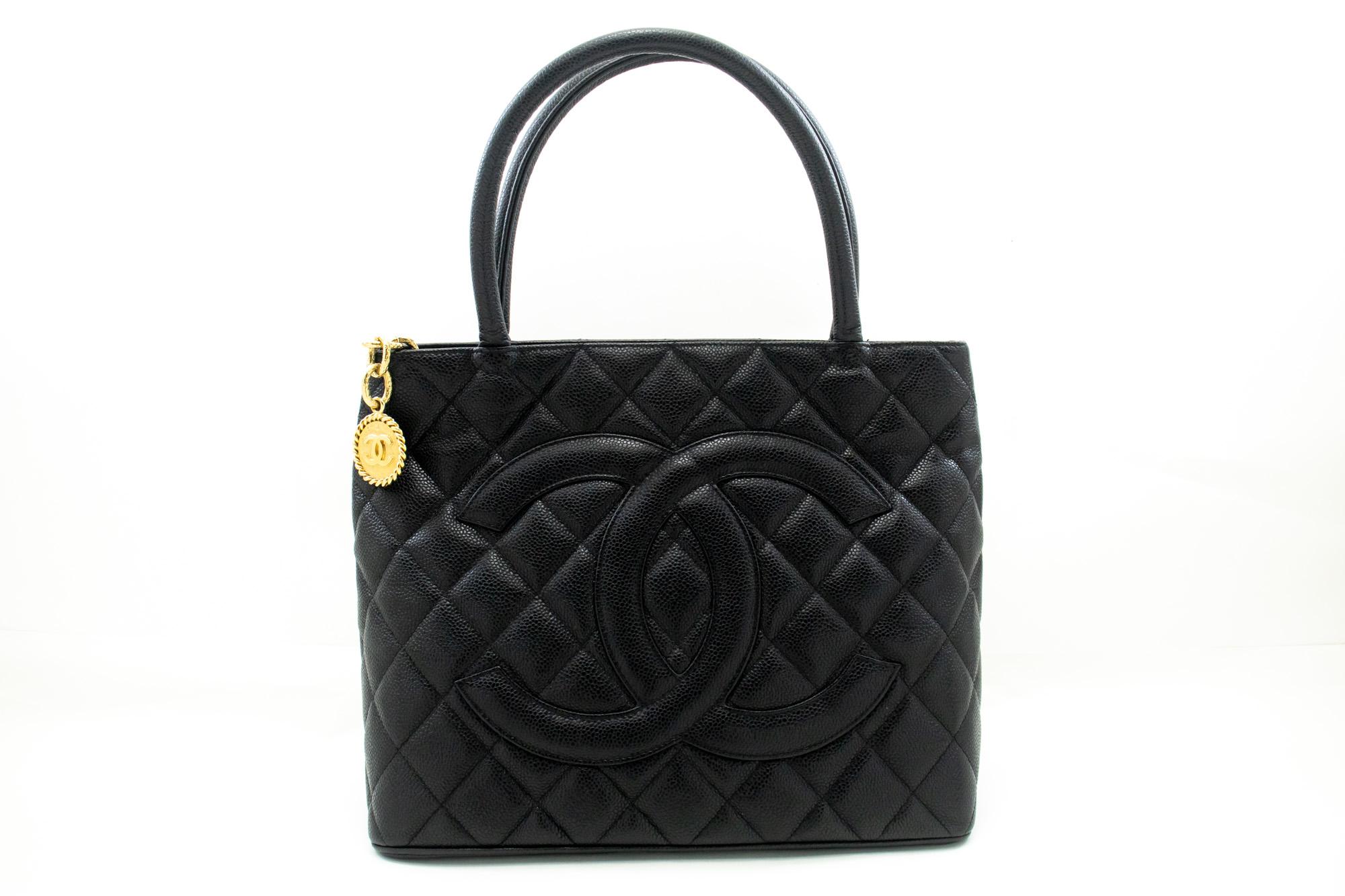 An authentic CHANEL Gold Medallion Caviar Shoulder Bag Grand Shopping Tote. The color is Black. The outside material is Leather. The pattern is Solid. This item is Contemporary. The year of manufacture would be 2008.
Conditions & Ratings
Outside