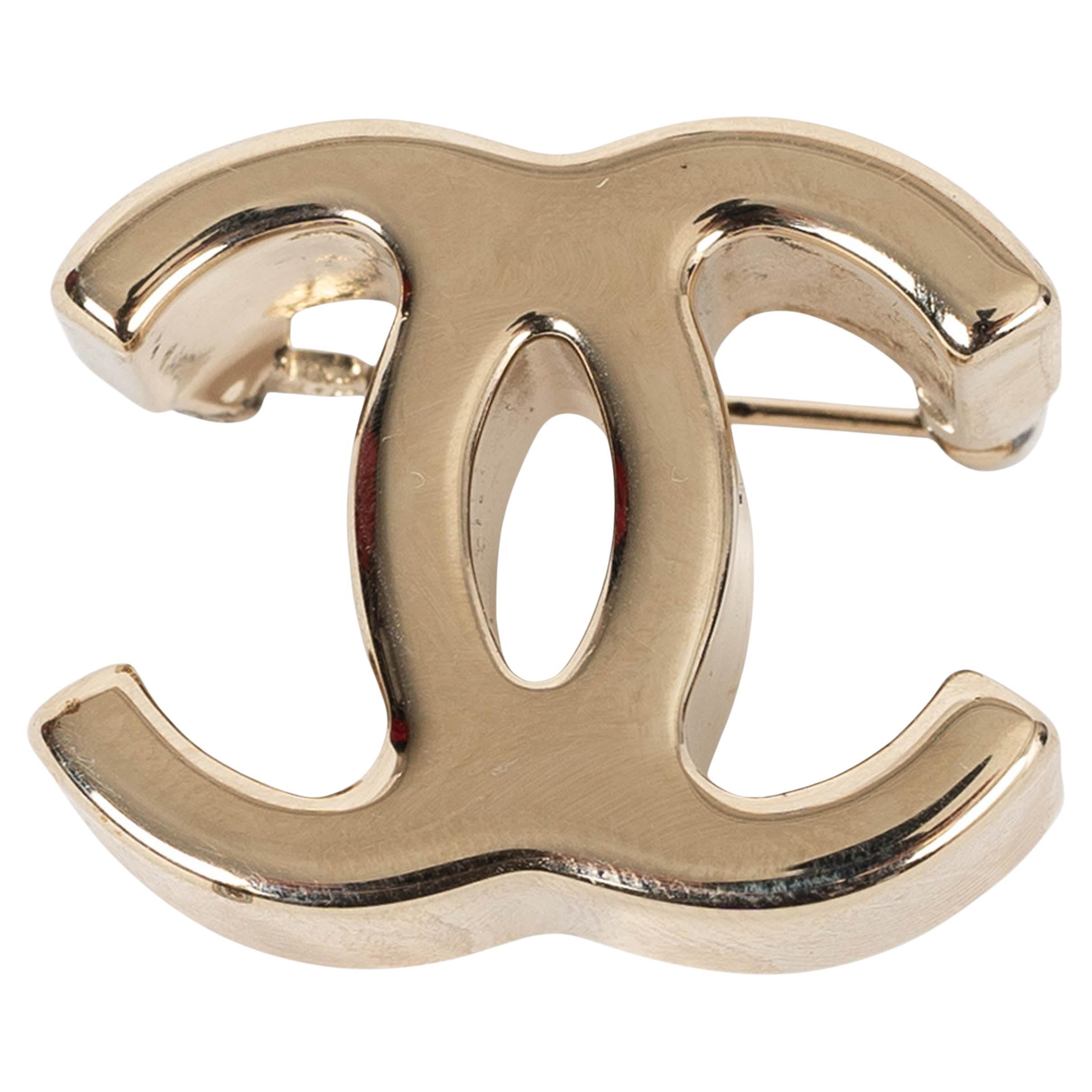 CHANEL gold metal 22K CC Brooch