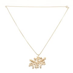 Chanel Gold Metal CC Snowflake Necklace