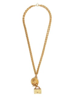 Chanel gold metal charms necklace