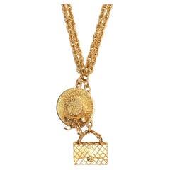 Vintage Chanel gold metal charms necklace