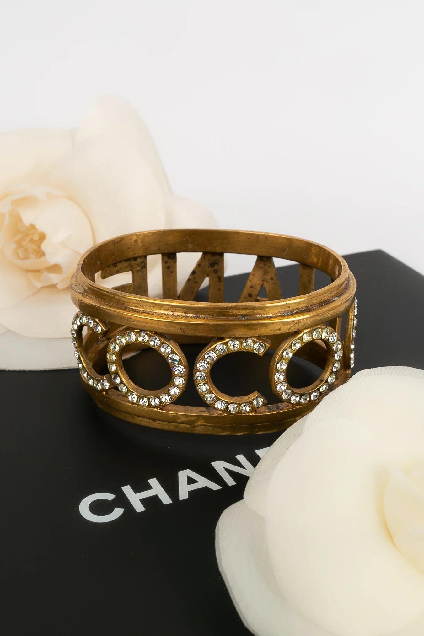Chanel Gold Metal Cuff Bracelet Paved with Rhinestones For Sale 2