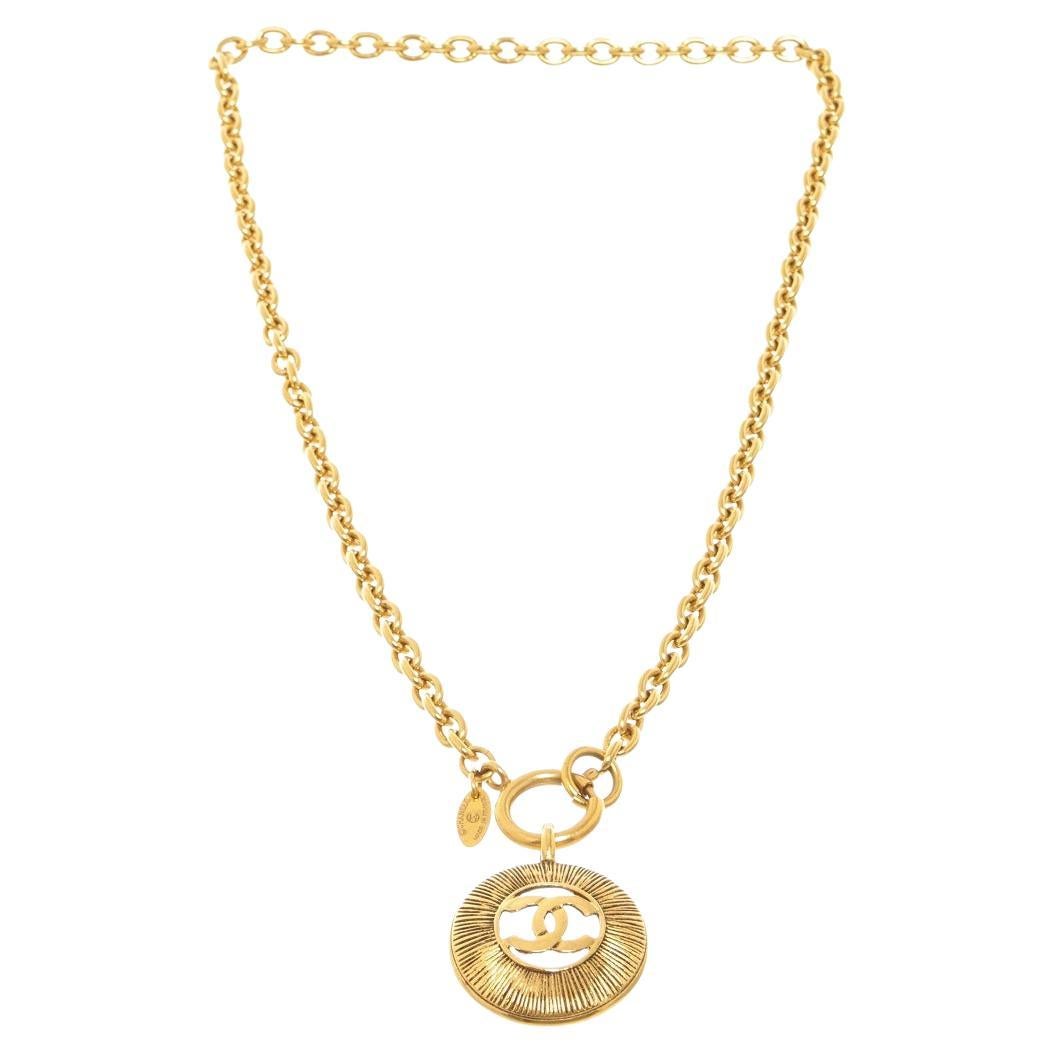 Chanel Gold Metal Vintage CC Round Pendant Necklace For Sale