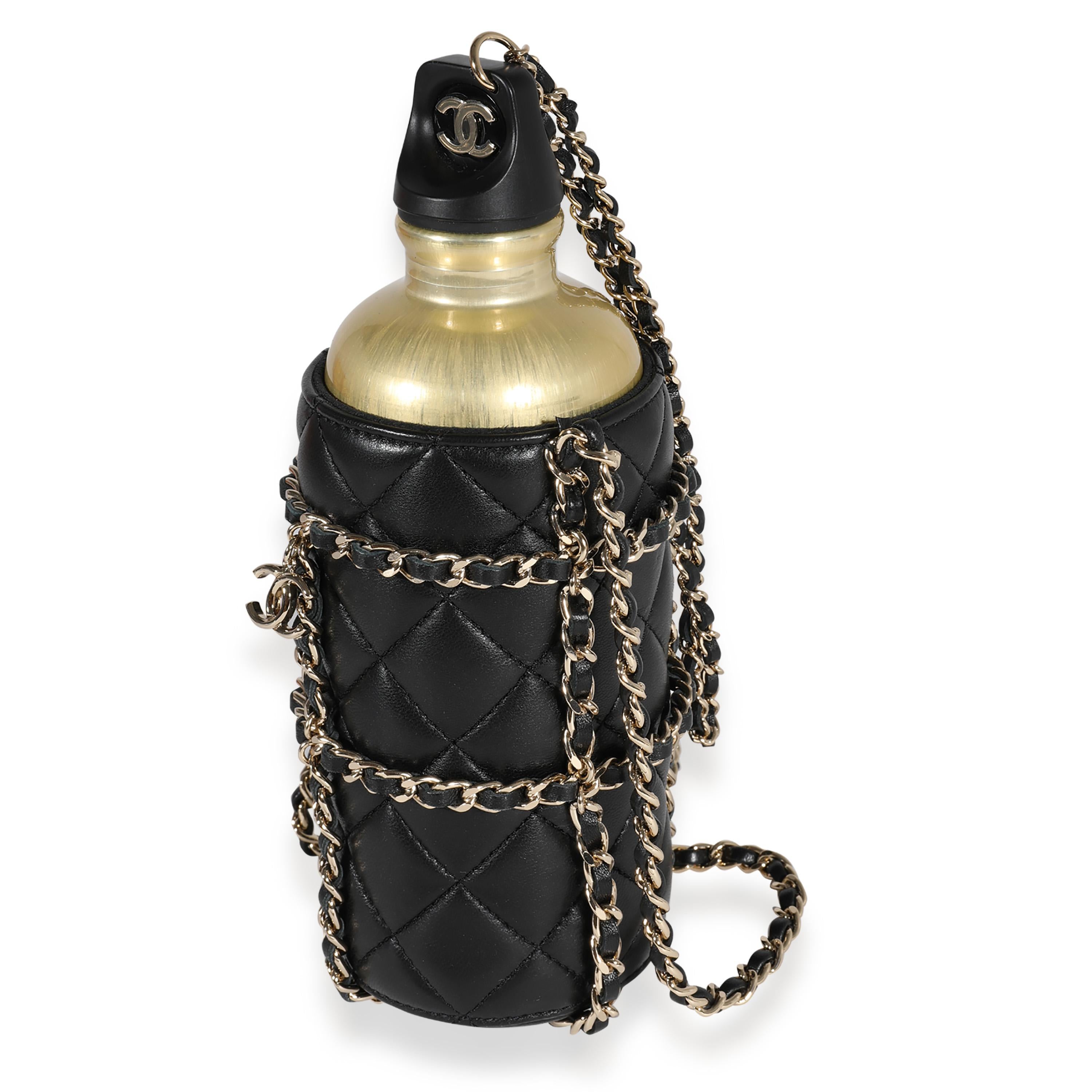 Listing Title: Chanel Gold Metal Water Bottle & Black Quilted Lambskin Holder
SKU: 122492
MSRP: 6000.00
Condition: Pre-owned 
Handbag Condition: Very Good
Condition Comments: Very Good Condition. Light scuffing at exterior. Scratching at hardware.