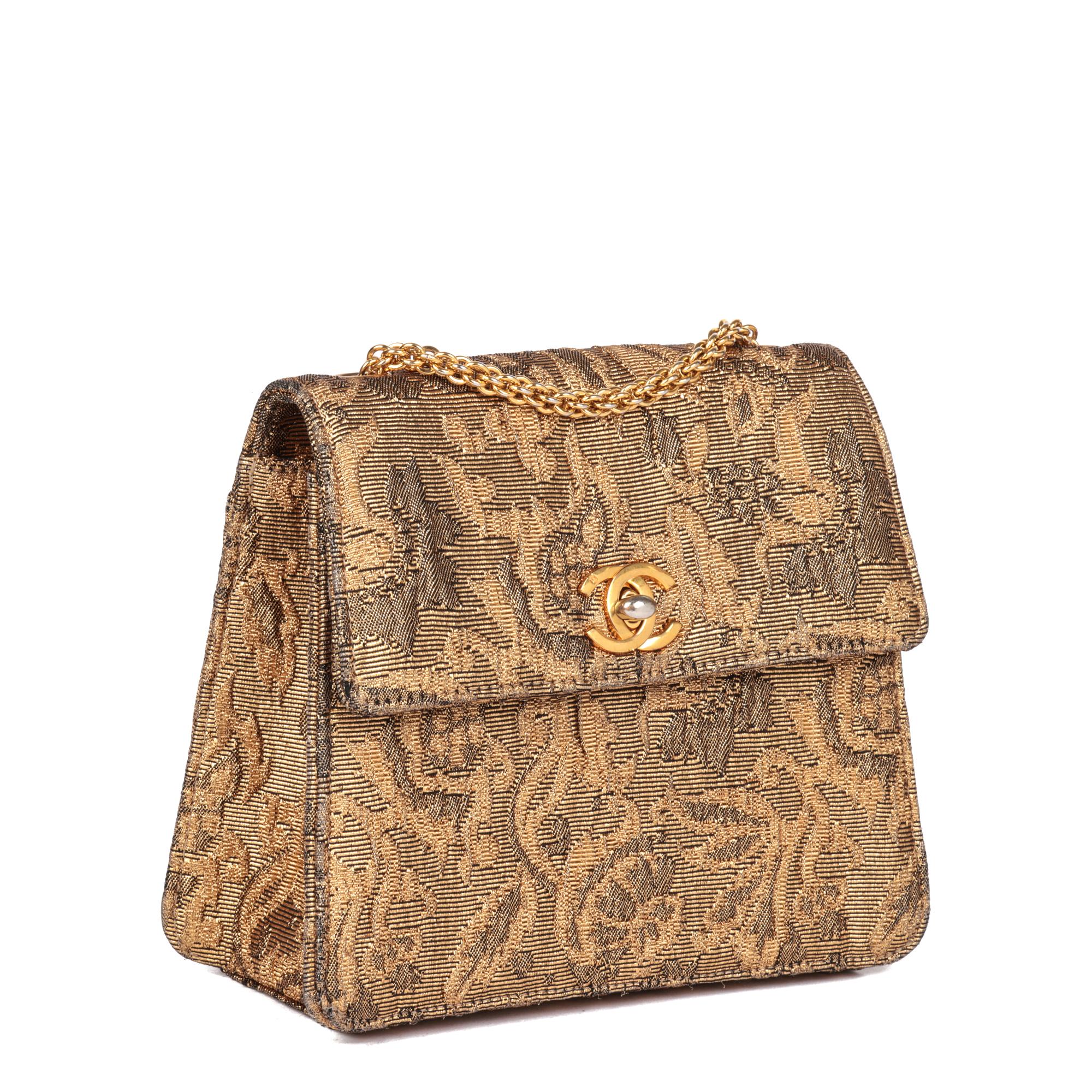 CHANEL
Gold Metallic Floral Woven Jacquard Vintage Mini Flap Bag

Serial Number: 5146600
Age (Circa): 1997
Accompanied By: Chanel Dust Bag, Authenticity Card, Care Booklet
Authenticity Details: Authenticity Card, Serial Sticker (Made in
