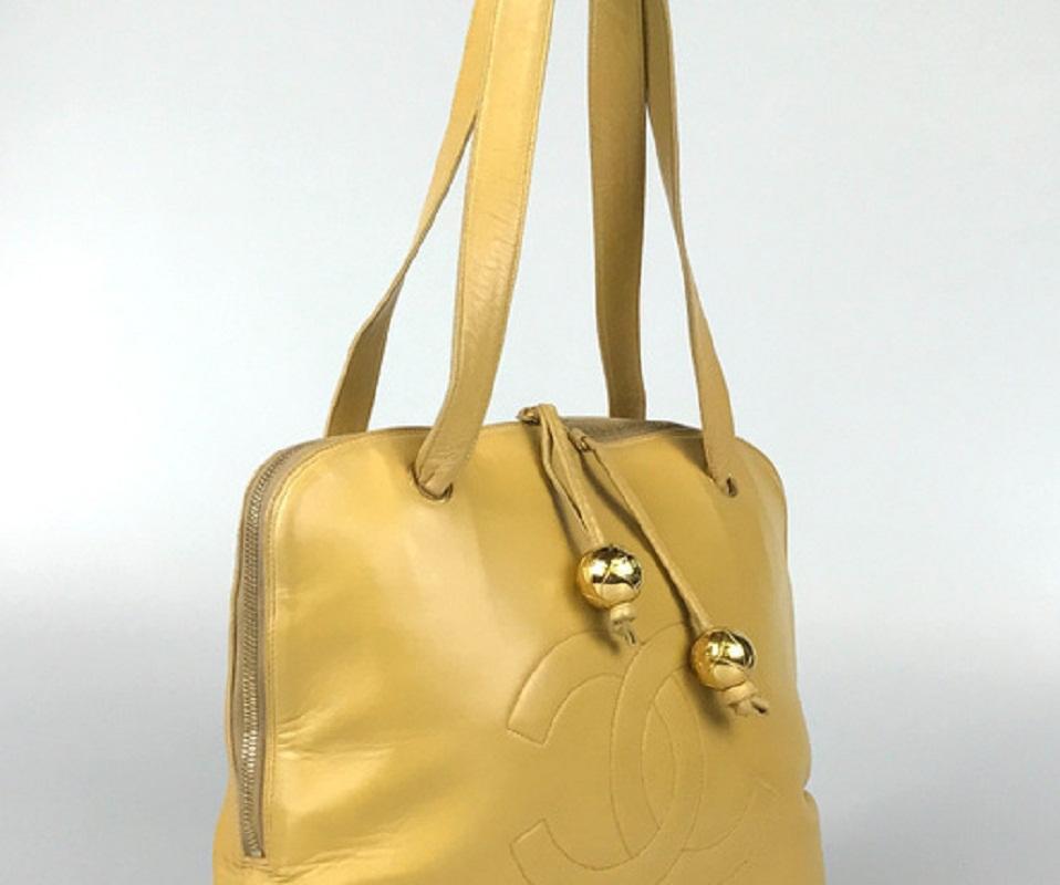 Women's Chanel Gold Metallic Lambskin Leather CC Logo Rounded Shoulder Bag