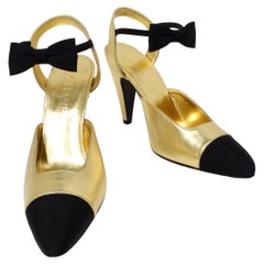 Chanel Gold Metallic Laminated Lambskin Grosgrain Slingback Pumps With Bows