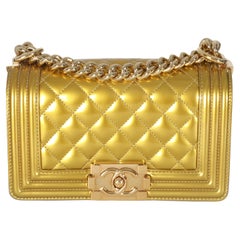 Chanel - Petit sac en cuir de veau verni matelassé - or métallisé
