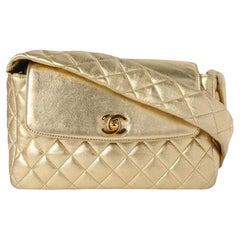 Chanel Borsa con lembo trapuntato con manico superiore in oro metallizzato
