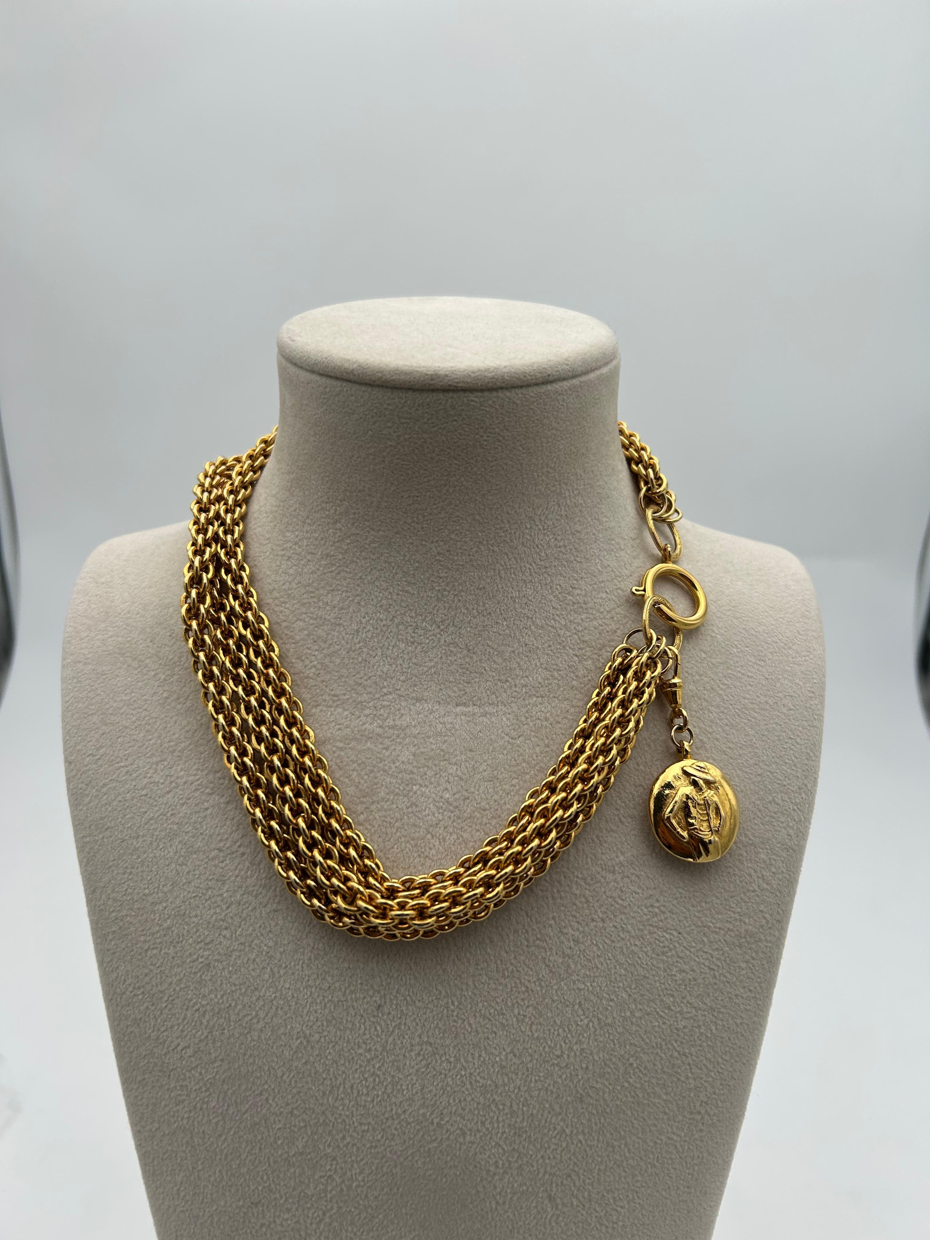 Chanel Gold Multi-Layer Necklace. Beautiful Chanel necklace with a COCO Chanel Pendant. This piece is a perfect statement of the brand attention to details and classiness making this a really sought after piece among collector and brand enthusiast.