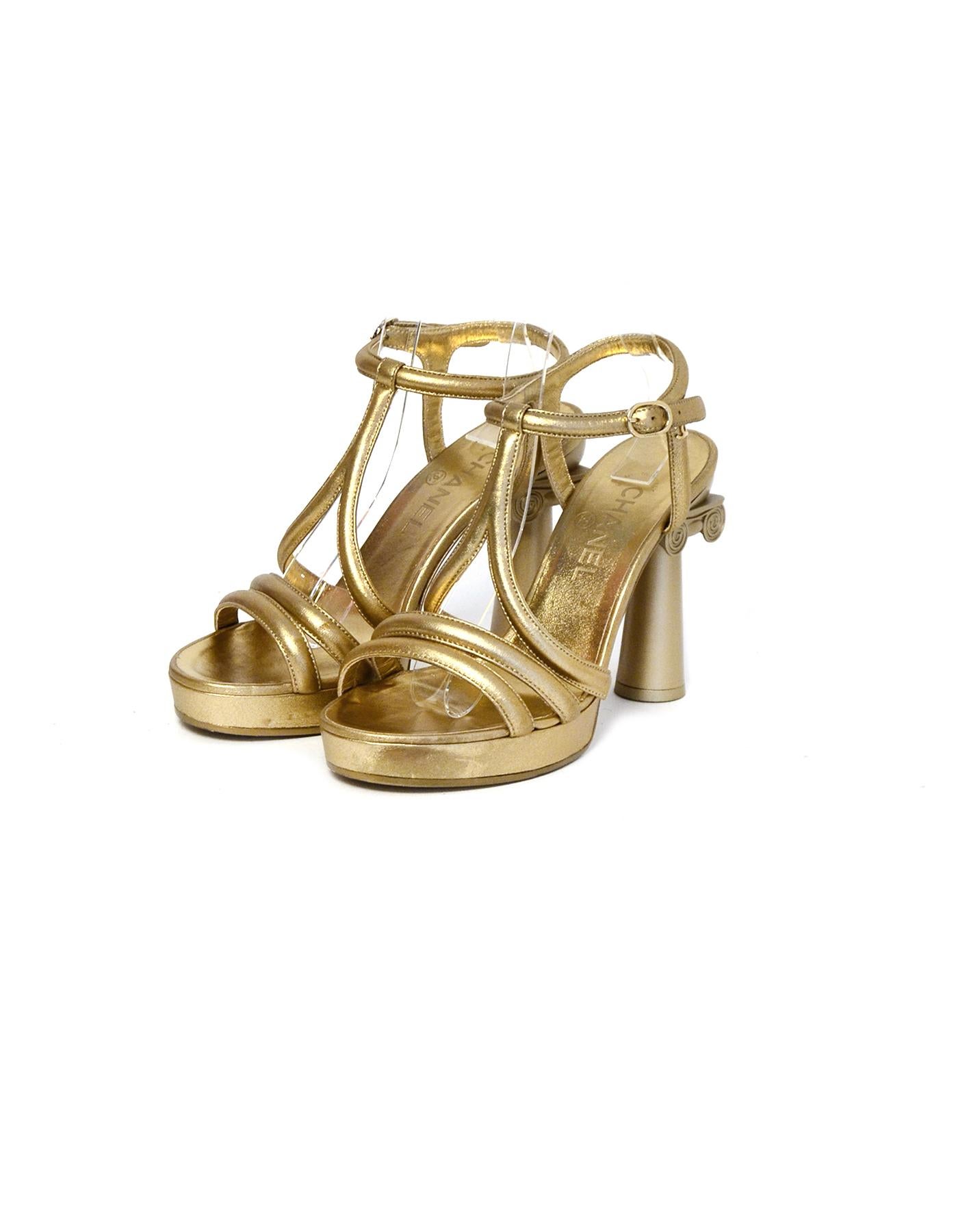 Chanel Gold Parthenon Grecian Column Platform Sandals sz 38

Made In: Italy
Year of Production: 2018
Color: Gold
Hardware: Goldtone hardware
Materials: Leather
Closure/Opening: Side buckle closure
Overall Condition: Very good pre-owned condition,