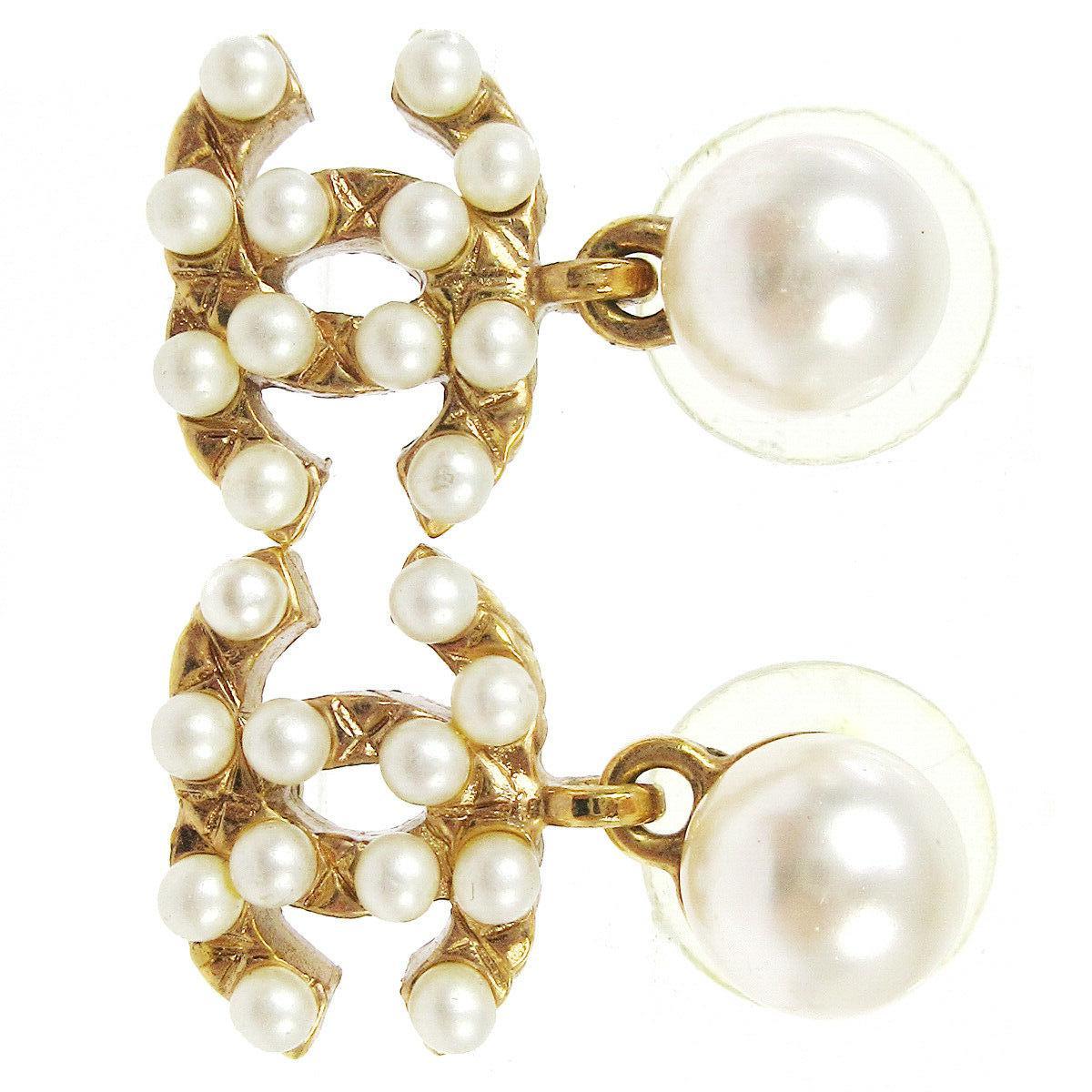Chanel Gold Pearl Charm CC Small Pierced Evening Dangle Drop Earrings

Faux Pearl
Metal
Gold tone hardware
For Pierced Ears
Made in France
Measures 0.50