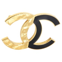 Spilla CC Chanel placcata in oro 2024