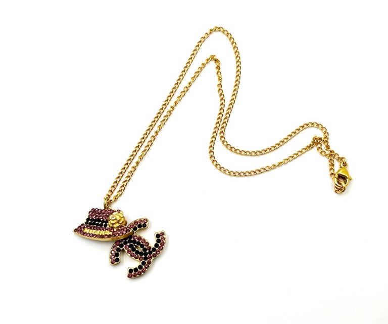 Chanel Gold Plated CC Hat Black Fuchsia Crystal Necklace For Sale at 1stDibs