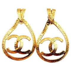 Chanel Gold Plated CC Ribbon Tear Drop Ribbon Large 2 in 1 Clip on Earrings