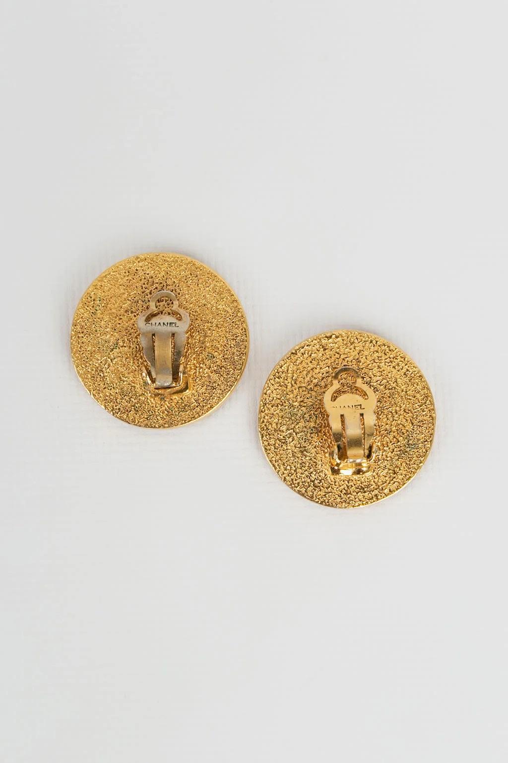 Chanel - Gold-plated clip earrings featuring a four-leaf clover.

Additional information:

Dimensions: 
Ø 3.5 cm

Condition: Very good condition

Seller Ref number: BOB36