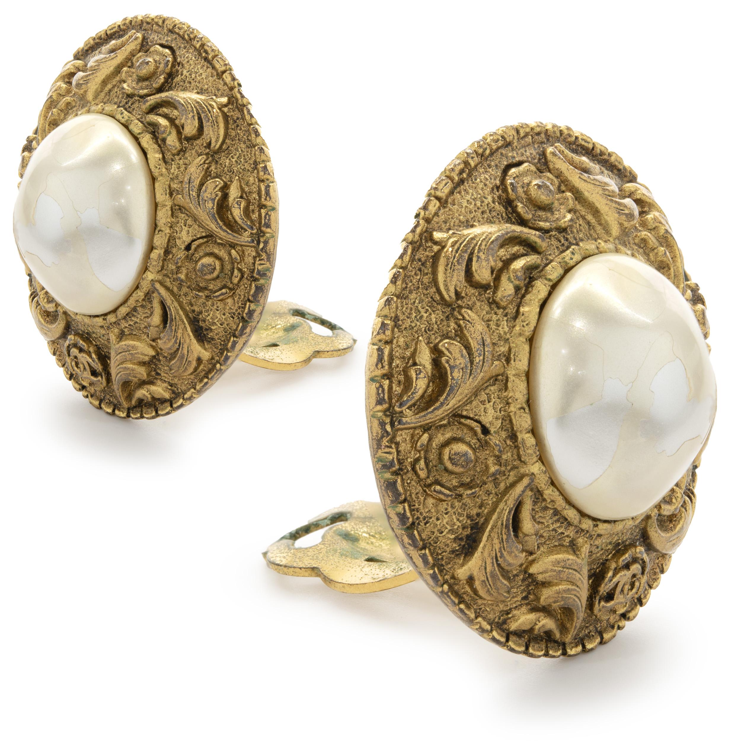 Designer: Chanel
Material: gold plated
Weight: 22.90 grams
Dimensions:  earrings measure 28.5mm wide