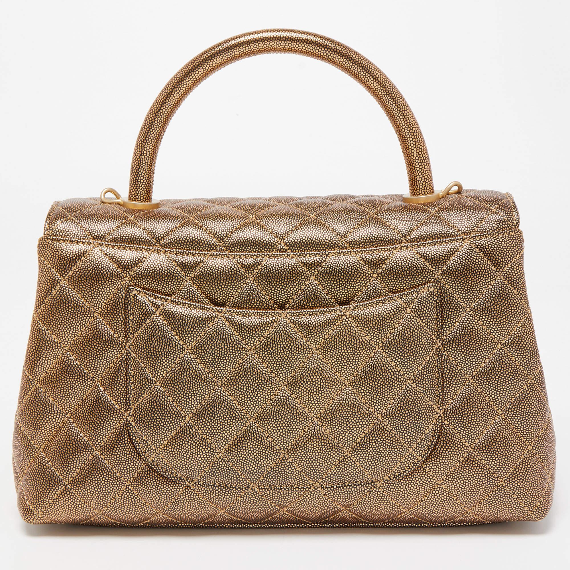 Every creation of Chanel maintains the legacy of the brand with its brilliant craftsmanship and artistic designs. From one of the most celebrated collections, this Coco bag comes exquisitely created from quilted Caviar leather and embodies an